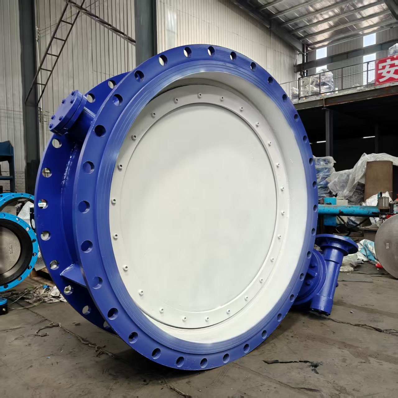 Rear view of electric flanged butterfly valve disc and flange