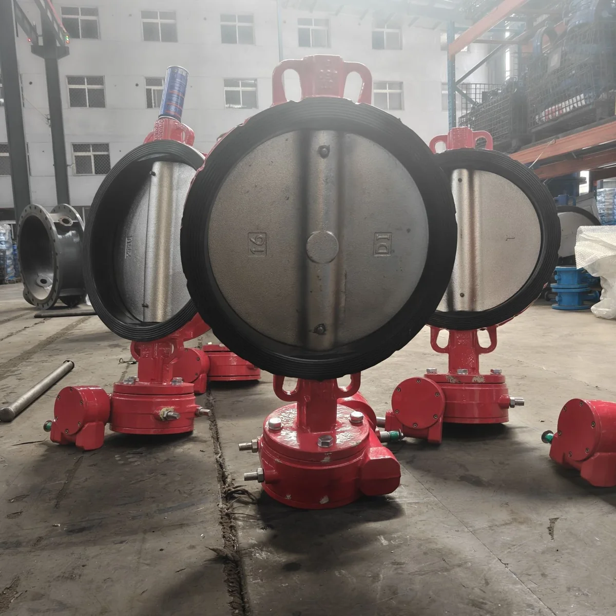Red wafer butterfly valve group with rubber lined disc